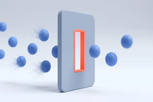 Ilustración en 3D: una placa gris vertical con una ranura estrecha de borde coral. A la izquierda se acercan esferas azules y dos se deshacen en partículas; a la derecha, las que han pasado siguen enteras. Fondo gris claro, sin texto.
